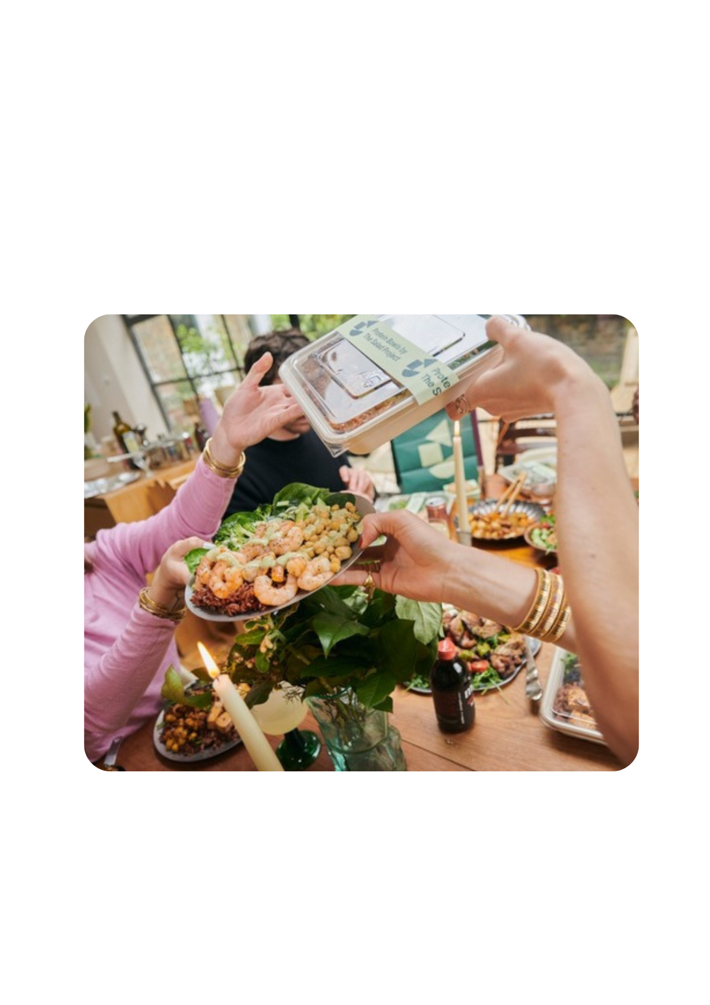 People swapping salads at The Salad Project