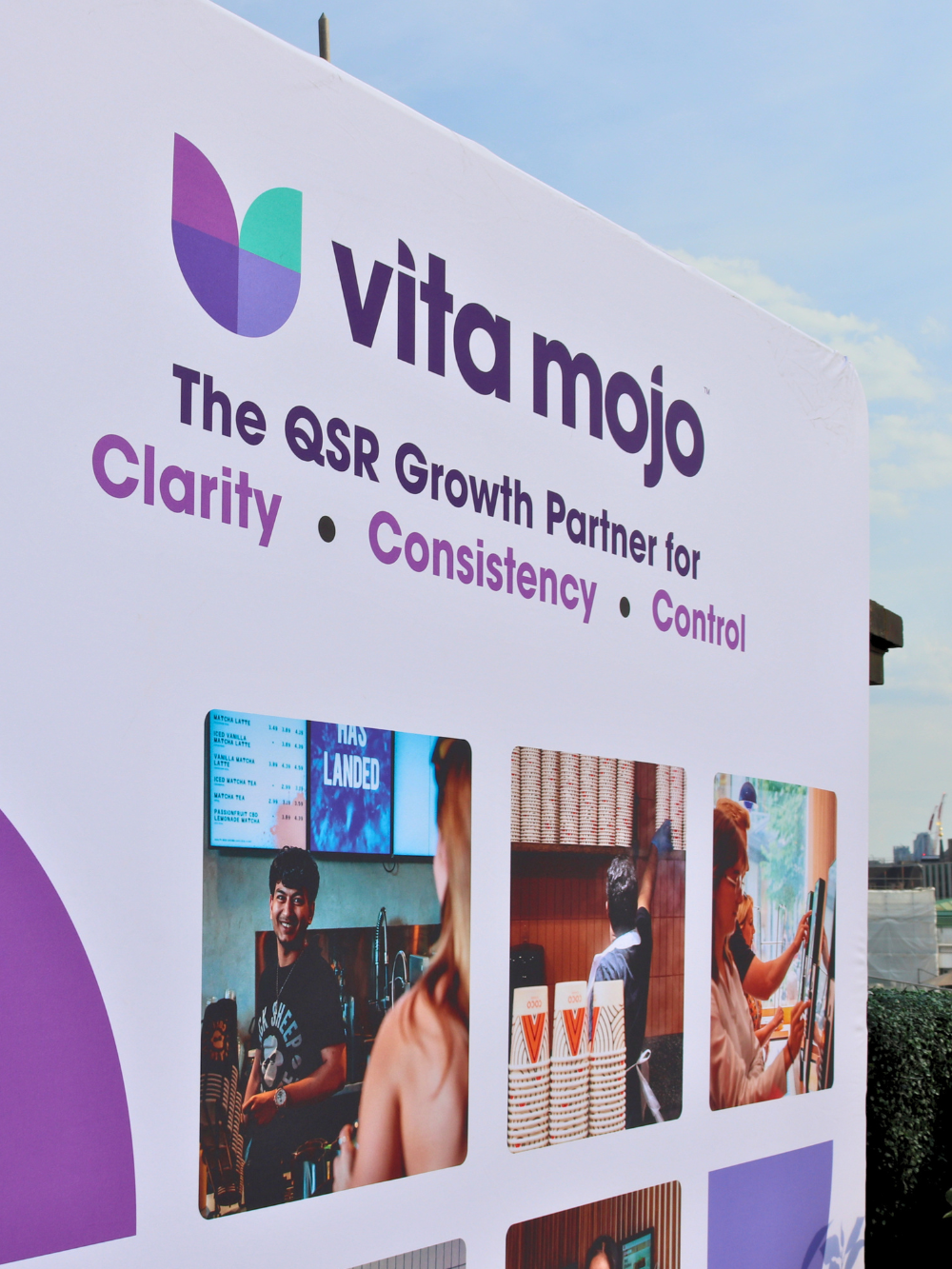 vita mojo on a banner against blue sky